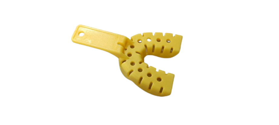 Ложка пластиковая перфорировынная с бортом  Низ №1 цвет желтый 